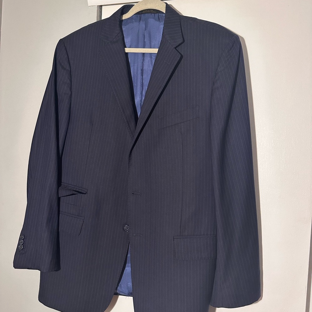 Custom Jos A Bank suit with fabric from Vitale Barberus Canonico.